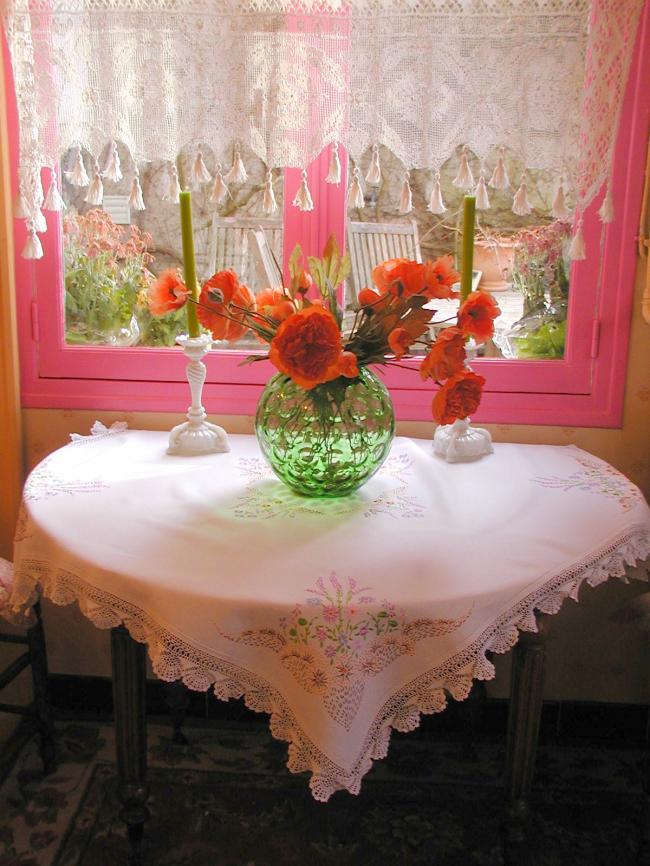 Really lovely tablecloth with hand-embroidered flowers and lace edging