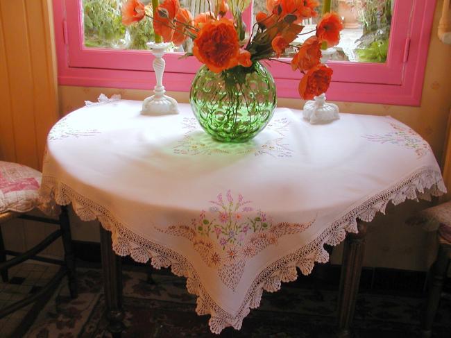 Really lovely tablecloth with hand-embroidered flowers and lace edging