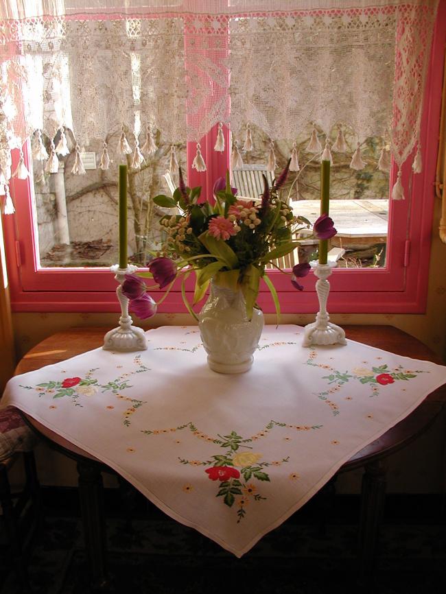 Sweet linen tablecloth with hand-embroidered red and yellow roses