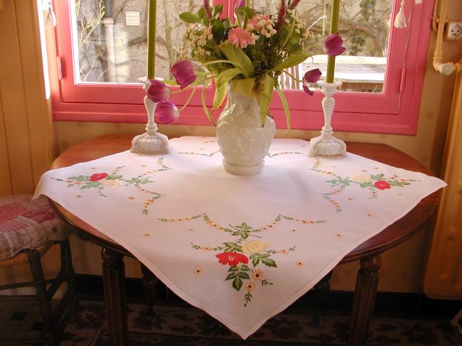 Sweet linen tablecloth with hand-embroidered red and yellow roses