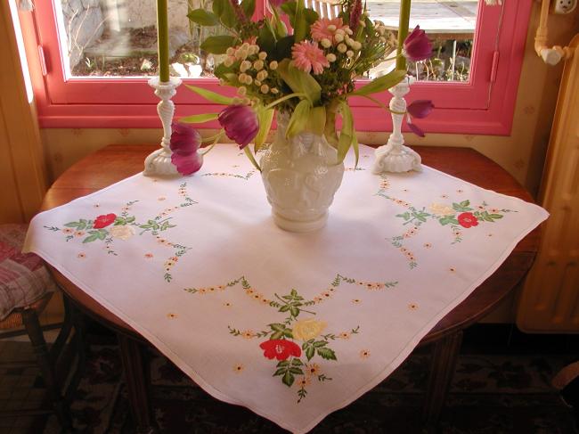 Sweet linen tablecloth with hand-embroidered red and yellow roses