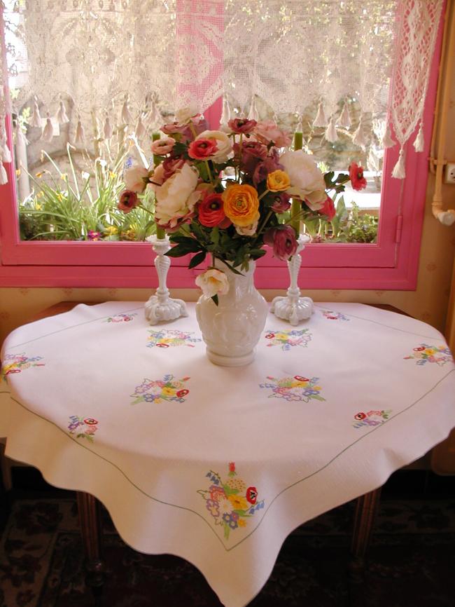 Really adorable tablecloth with hand-embroidered Spring bouquet