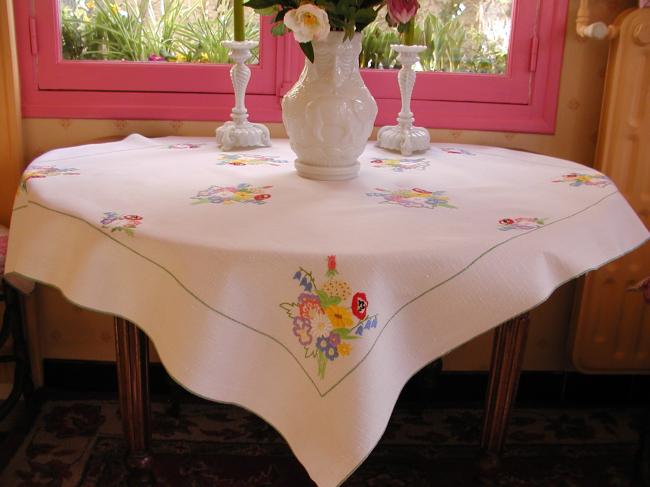 Really adorable tablecloth with hand-embroidered Spring bouquet