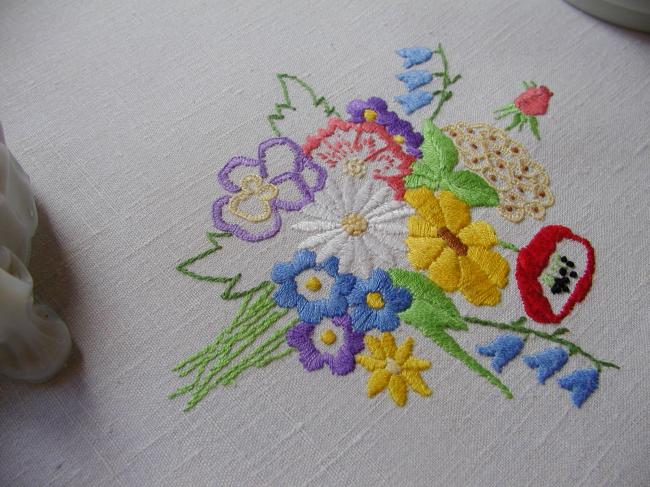 Really adorable tablecloth with hand-embroidered Spring bouquet