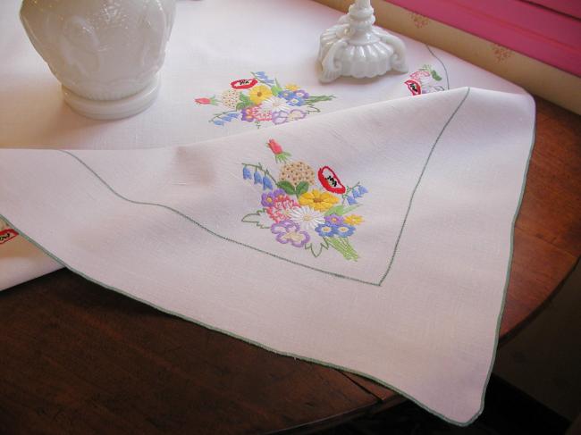 Really adorable tablecloth with hand-embroidered Spring bouquet