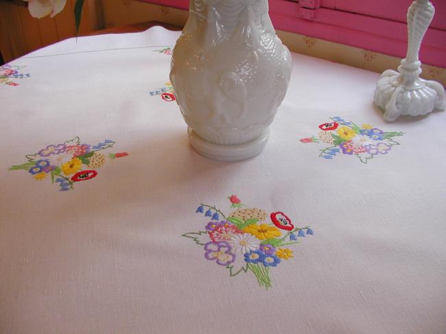 Really adorable tablecloth with hand-embroidered Spring bouquet