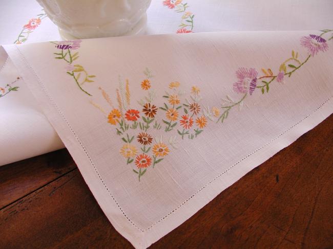 Lovely tablecloth with hand-embroidered flowers in crown and long bell-flower