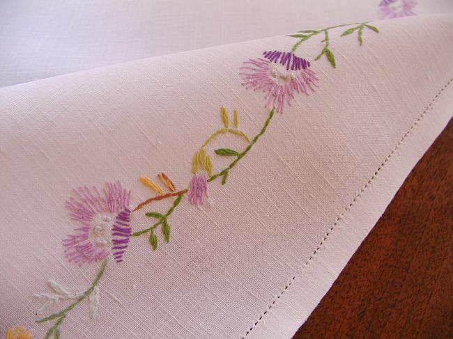 Lovely tablecloth with hand-embroidered flowers in crown and long bell-flower