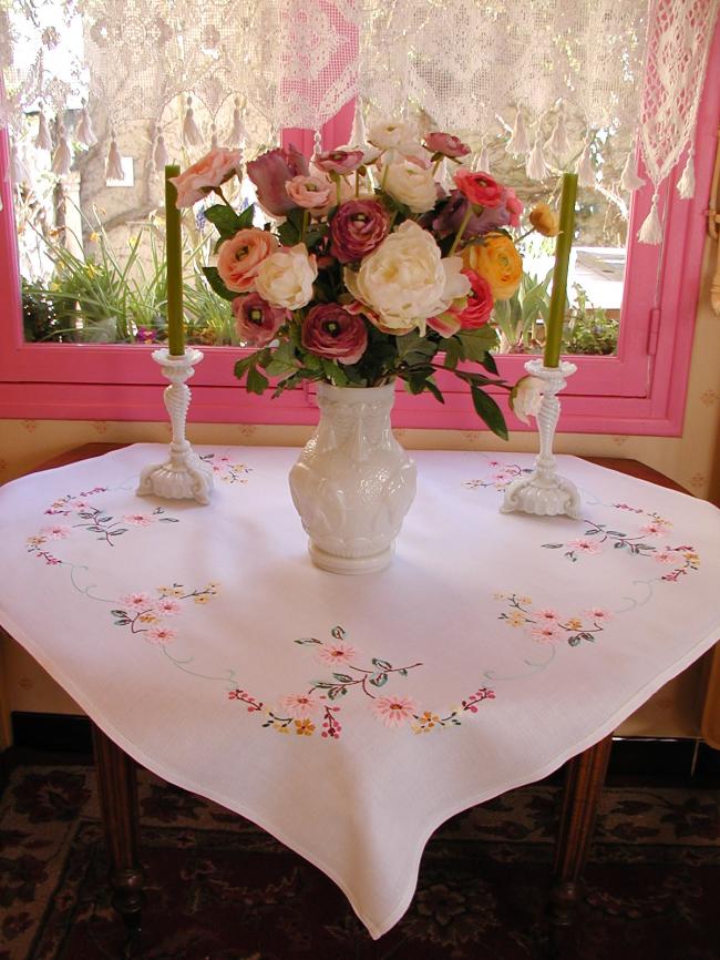 Lovely tablecloth with hand-embroidered blooming apple tree