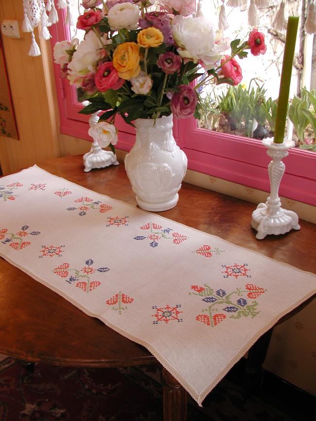 Very pretty table runner with hand-emboidery made in cross stitches