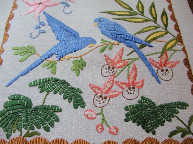 Lovely linen doily with hand-embroidered exotic birds