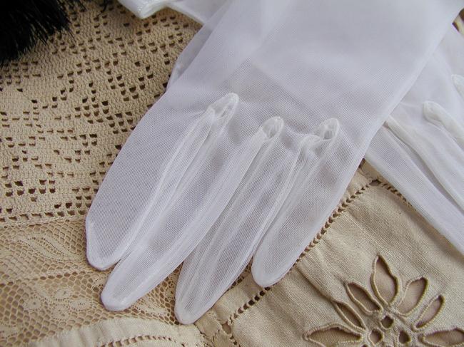 Charming pair of gloves in veil in white color, circa 1950