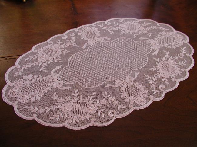 Beautiful oval pink  able centre made of embroidered net