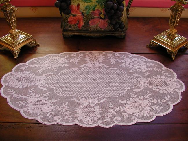 Beautiful oval pink  able centre made of embroidered net