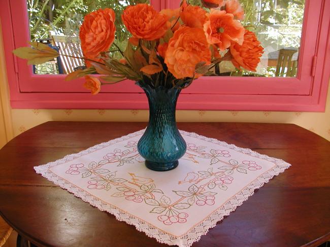 Very pretty table centre with birds and branches of cherry