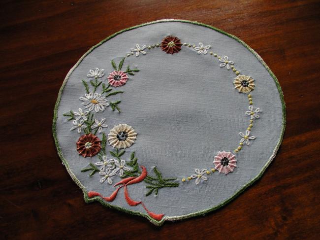Sweet doily with  embroidered field flowers