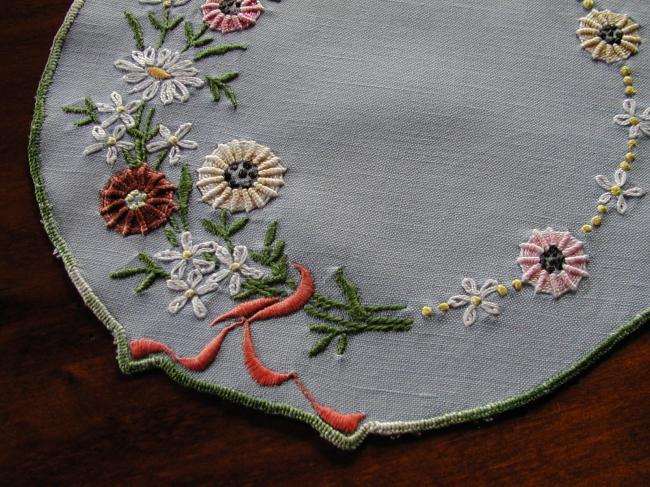 Sweet doily with  embroidered field flowers