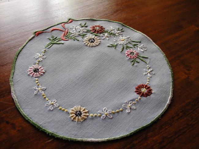 Sweet doily with  embroidered field flowers