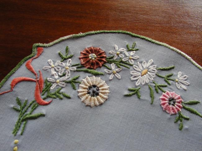 Sweet doily with  embroidered field flowers