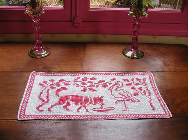 Lovely cross stitches table runner with fable of the Fox and the stork