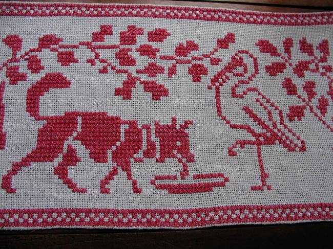 Lovely cross stitches table runner with fable of the Fox and the stork