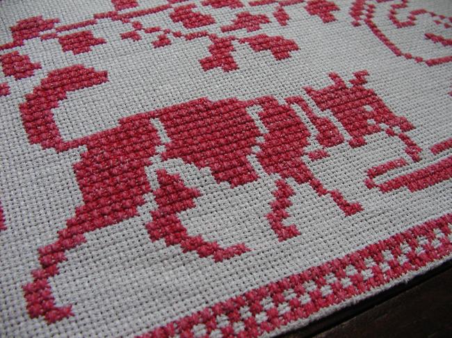 Lovely cross stitches table runner with fable of the Fox and the stork