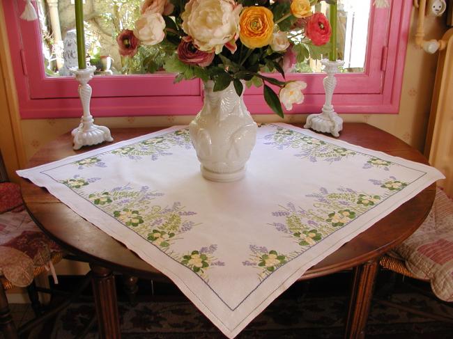 Gorgeous tablecloth with hand-embroidered wild primerose and bluebells