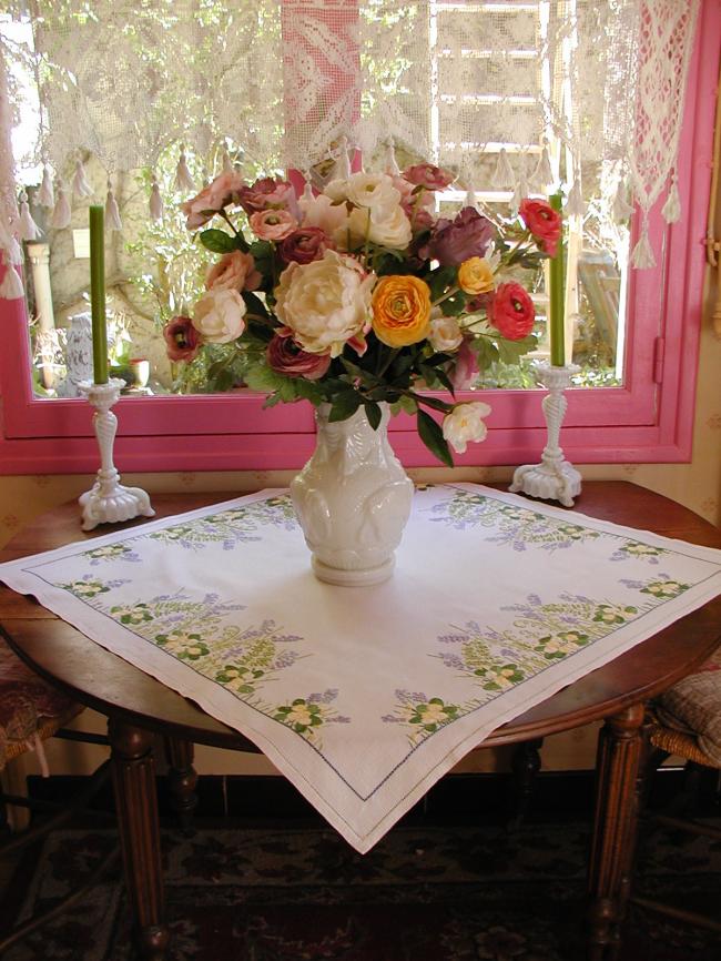 Gorgeous tablecloth with hand-embroidered wild primerose and bluebells