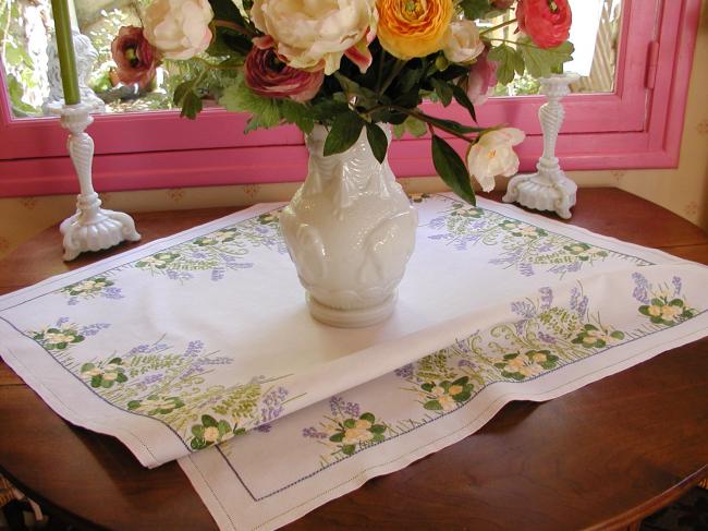 Gorgeous tablecloth with hand-embroidered wild primerose and bluebells