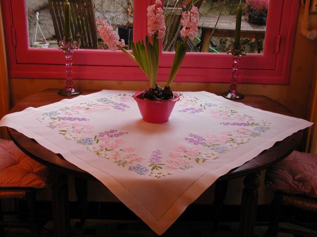 Breathtaking embroidered tablecloth with summer flowers