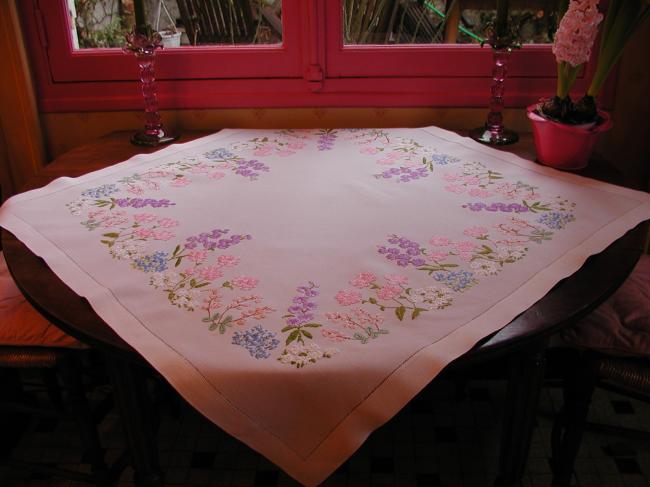 Breathtaking embroidered tablecloth with summer flowers