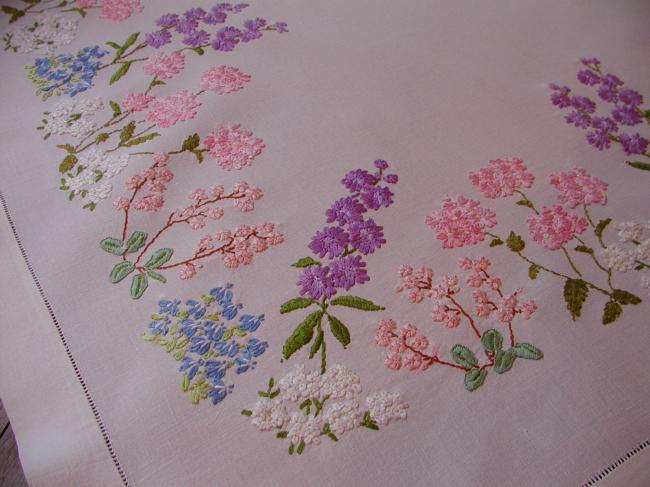 Breathtaking embroidered tablecloth with summer flowers