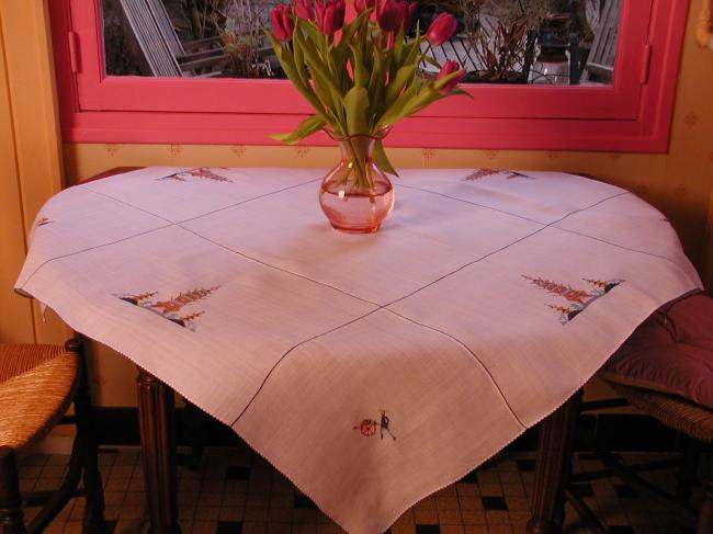 So lovely embroidered tablecloth with indo-chineese landscape