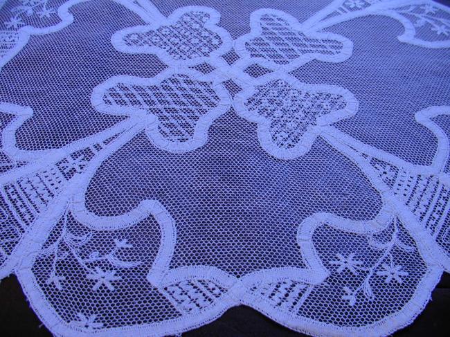 Wonderful doily with net embroidery and tape lace works