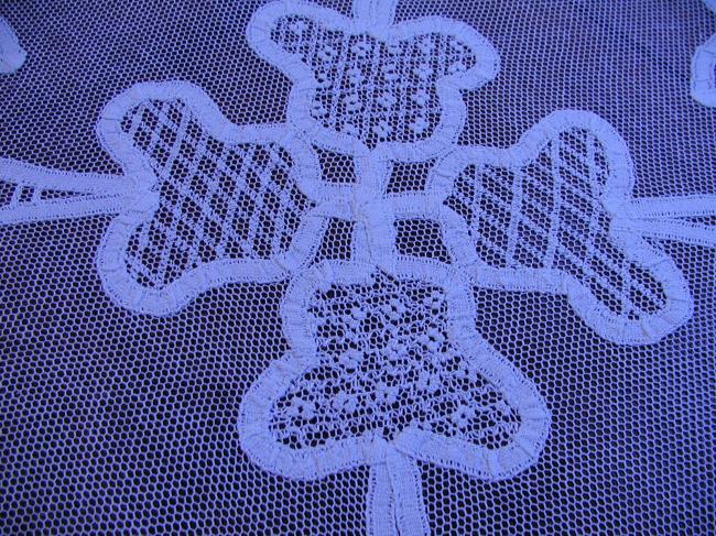 Wonderful doily with net embroidery and tape lace works