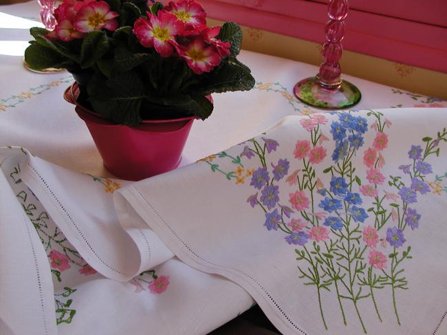 Breathtaking tablecloth with hand embroidered lavish delphinium flowers