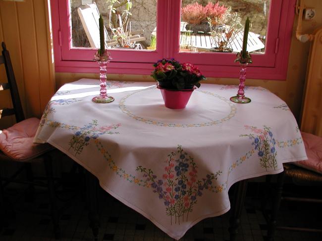 Breathtaking tablecloth with hand embroidered lavish delphinium flowers