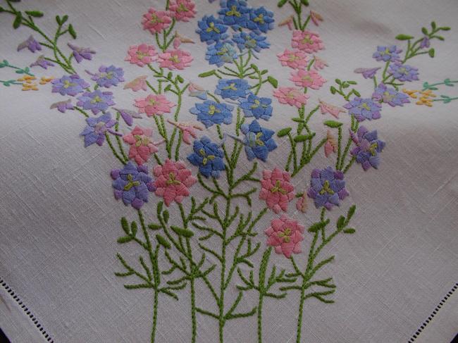 Breathtaking tablecloth with hand embroidered lavish delphinium flowers