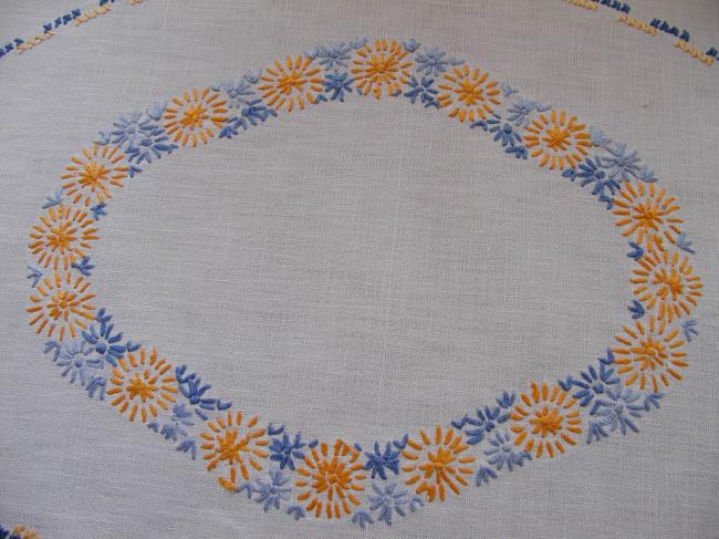 Very sweet oval table centre with orange and blue embroidered flowers