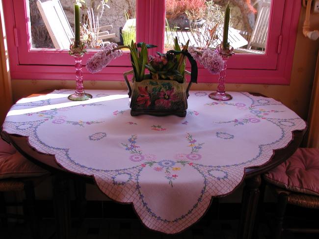 A really romantic tablecloth with charming embroidered flowers