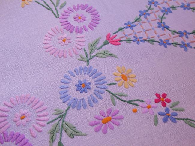 A really romantic tablecloth with charming embroidered flowers