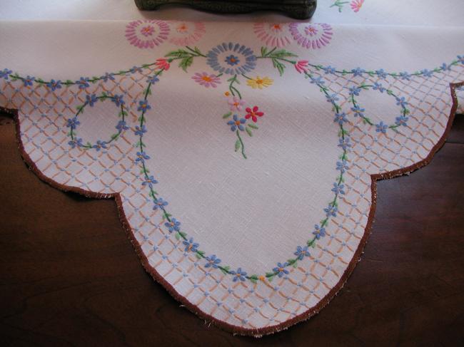 A really romantic tablecloth with charming embroidered flowers