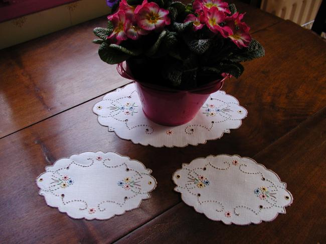 Lovely set of doilies for symmetrical decor in colorful Madeira embroidery